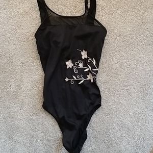 One piece swimsuit. Black w/floral design